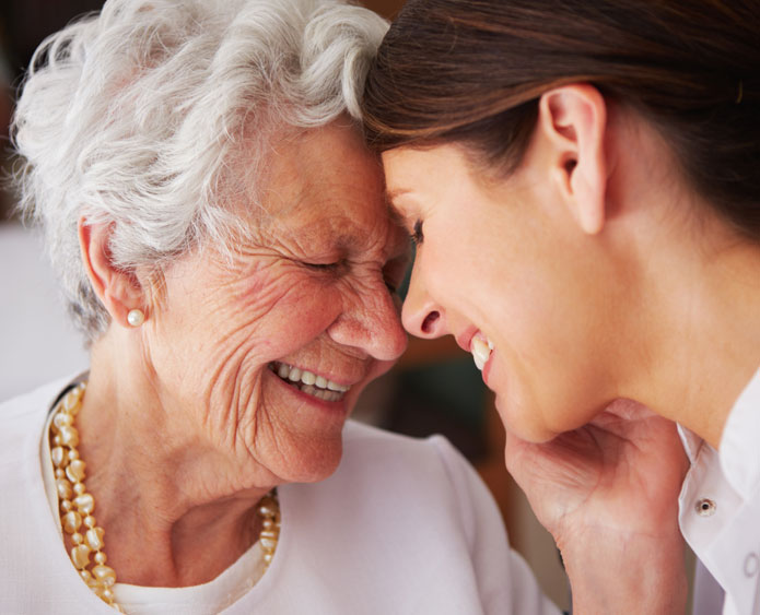 a joyful embrace with a senior woman