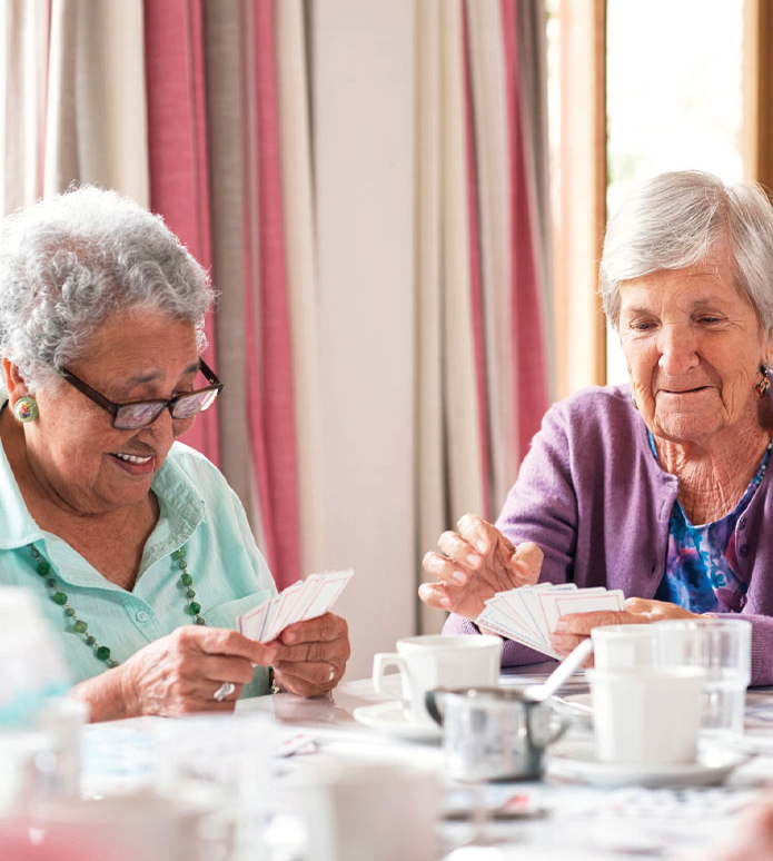 seniors playing cards