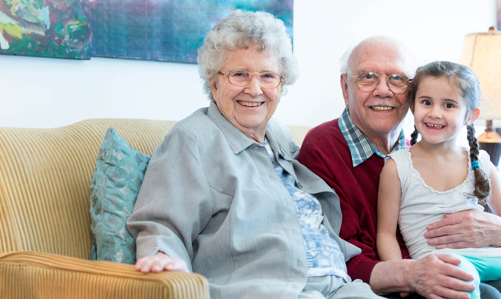 Grandparents with their granddaughter